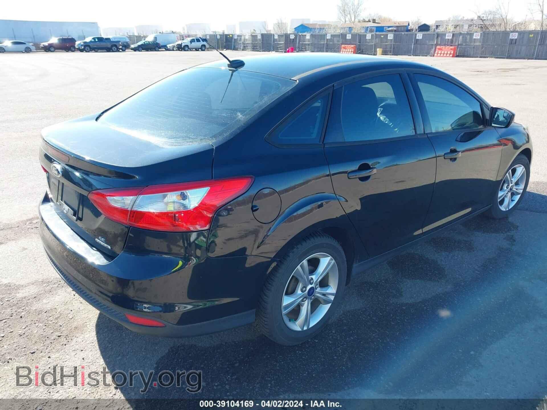 2014 FORD FOCUS - VIN: 1FADP3F21EL123390 - Photo 4
