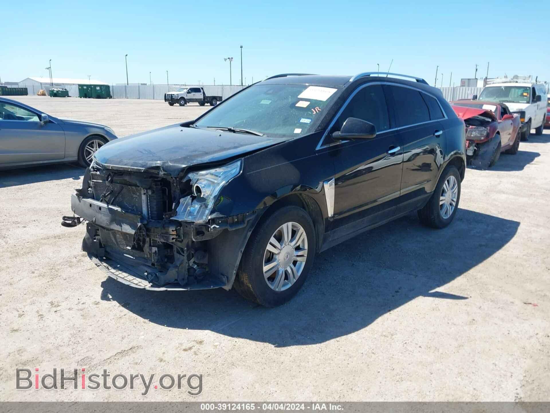 2013 CADILLAC SRX - VIN: 3GYFNCE37DS596104 - Фото 2
