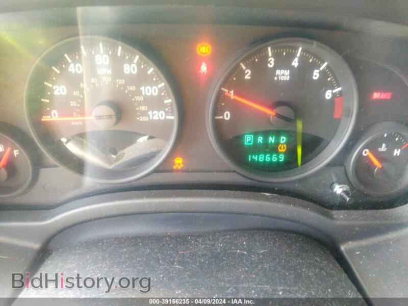 2011 Jeep COMPASS (VIN 1J4NF1FB3BD135661) — photo 7 of 12