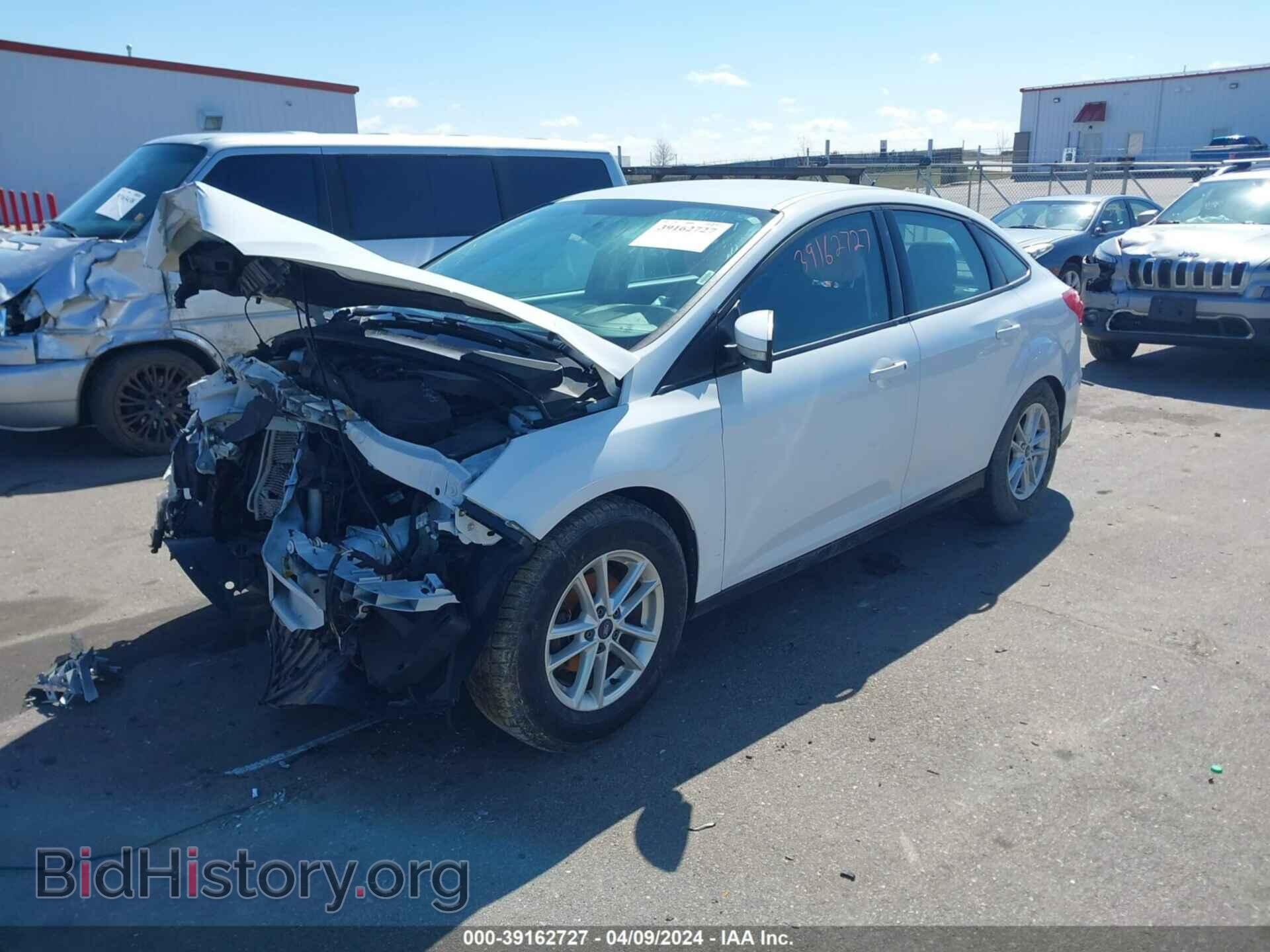 2016 FORD FOCUS - VIN: 1FADP3F27GL305565 - Фото 2