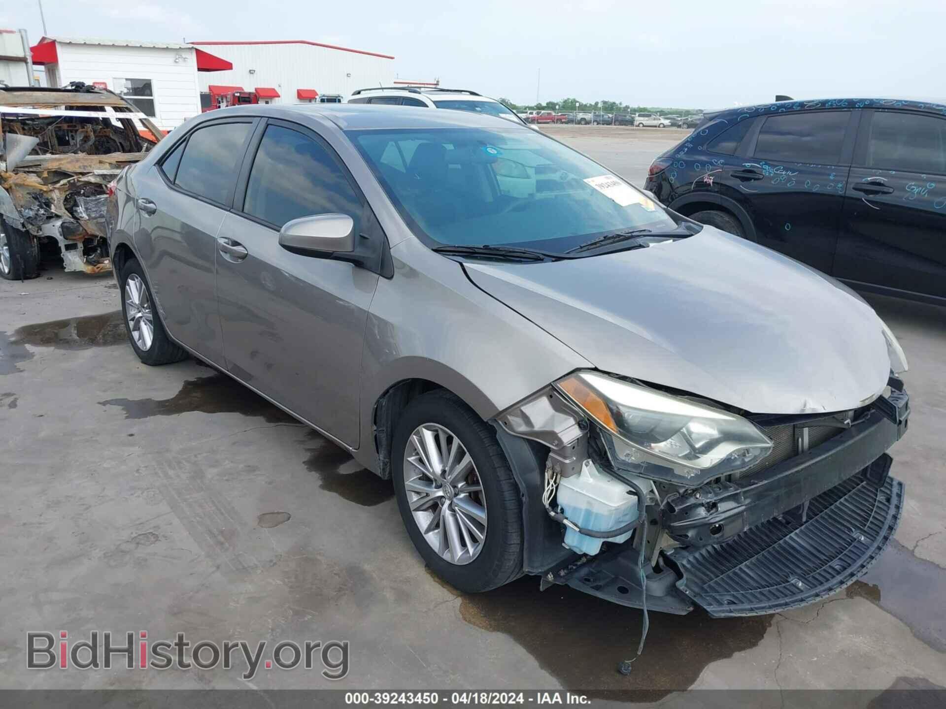 Фотография 5YFBURHE9EP099996 - TOYOTA COROLLA 2014