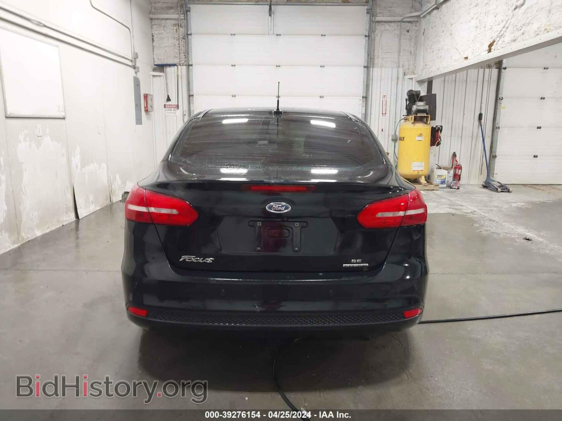 2016 FORD FOCUS - VIN: 1FADP3F2XGL301803 - Фото 16
