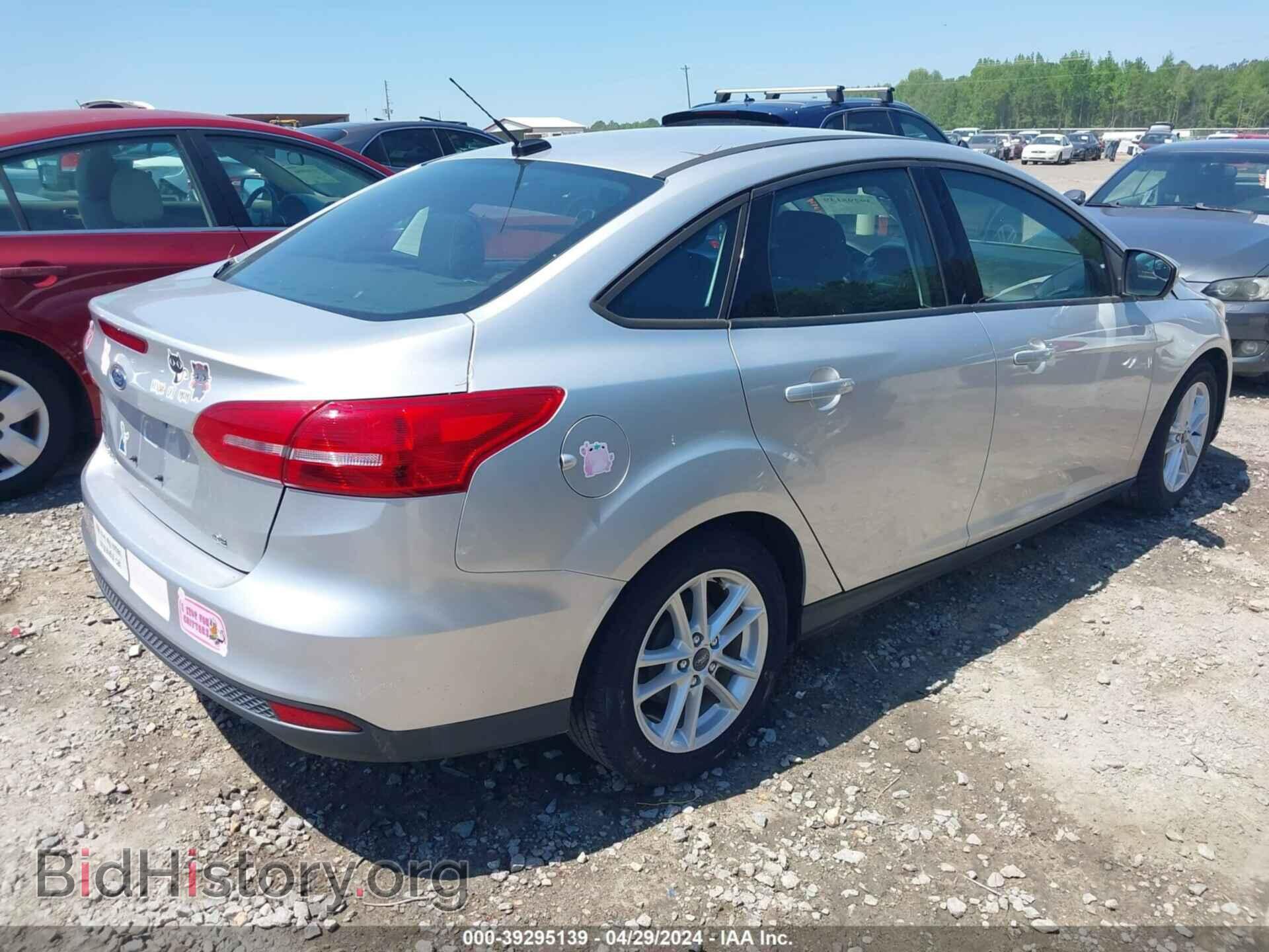 2017 FORD FOCUS - VIN: 1FADP3F29HL211107 - Photo 4