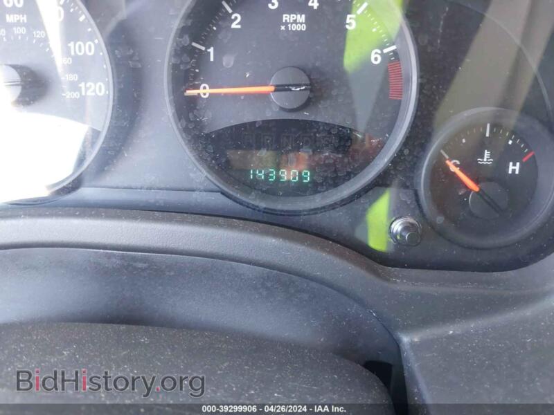 2011 Jeep COMPASS (VIN 1J4NT1FA0BD138355) — photo 7 of 11