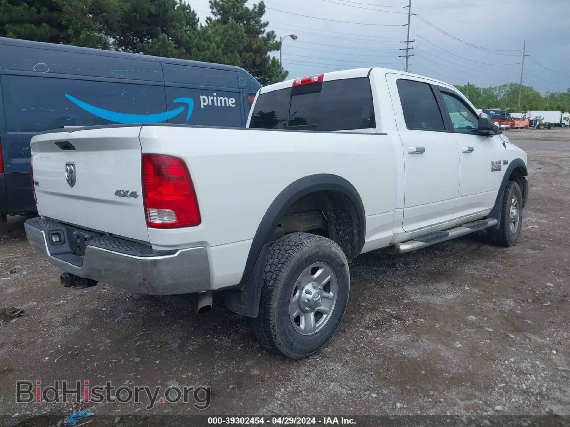 2016 RAM 2500 - VIN: 3C6TR5DT3GG182987 - Фото 4