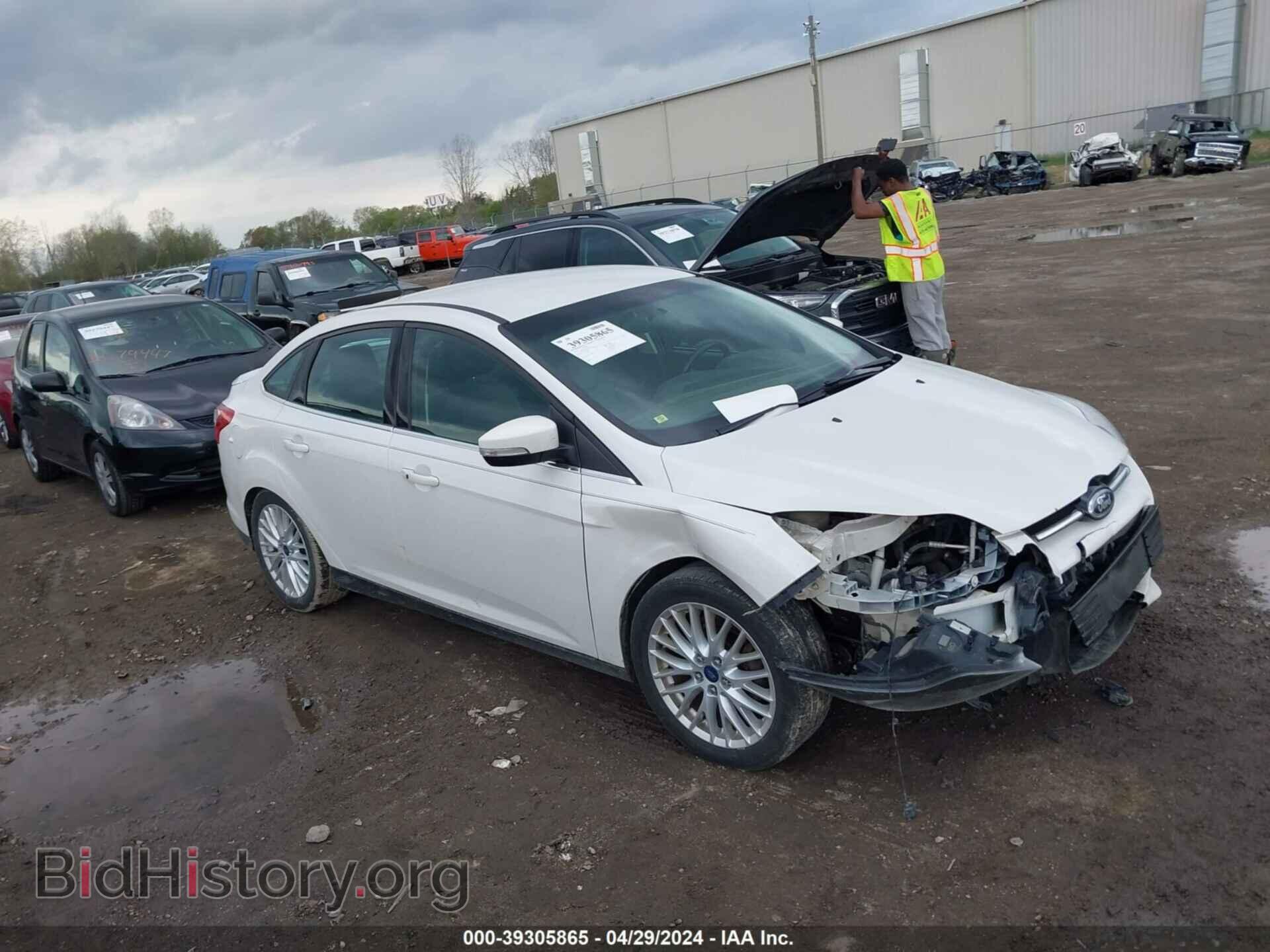 Фотография 1FADP3J27EL107721 - FORD FOCUS 2014