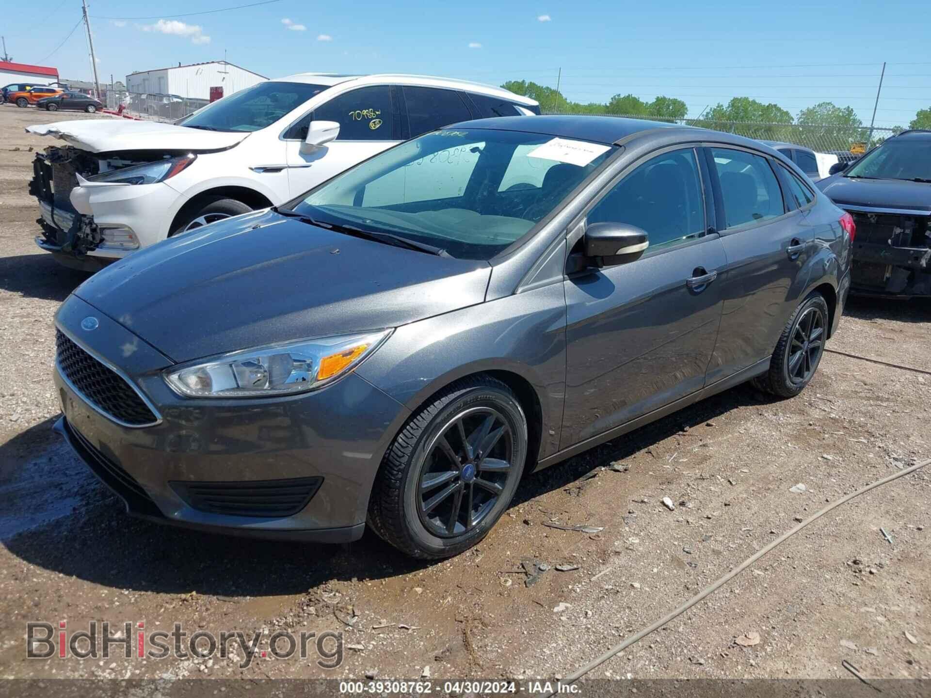 2016 FORD FOCUS - VIN: 1FADP3F24GL386816 - Фото 2