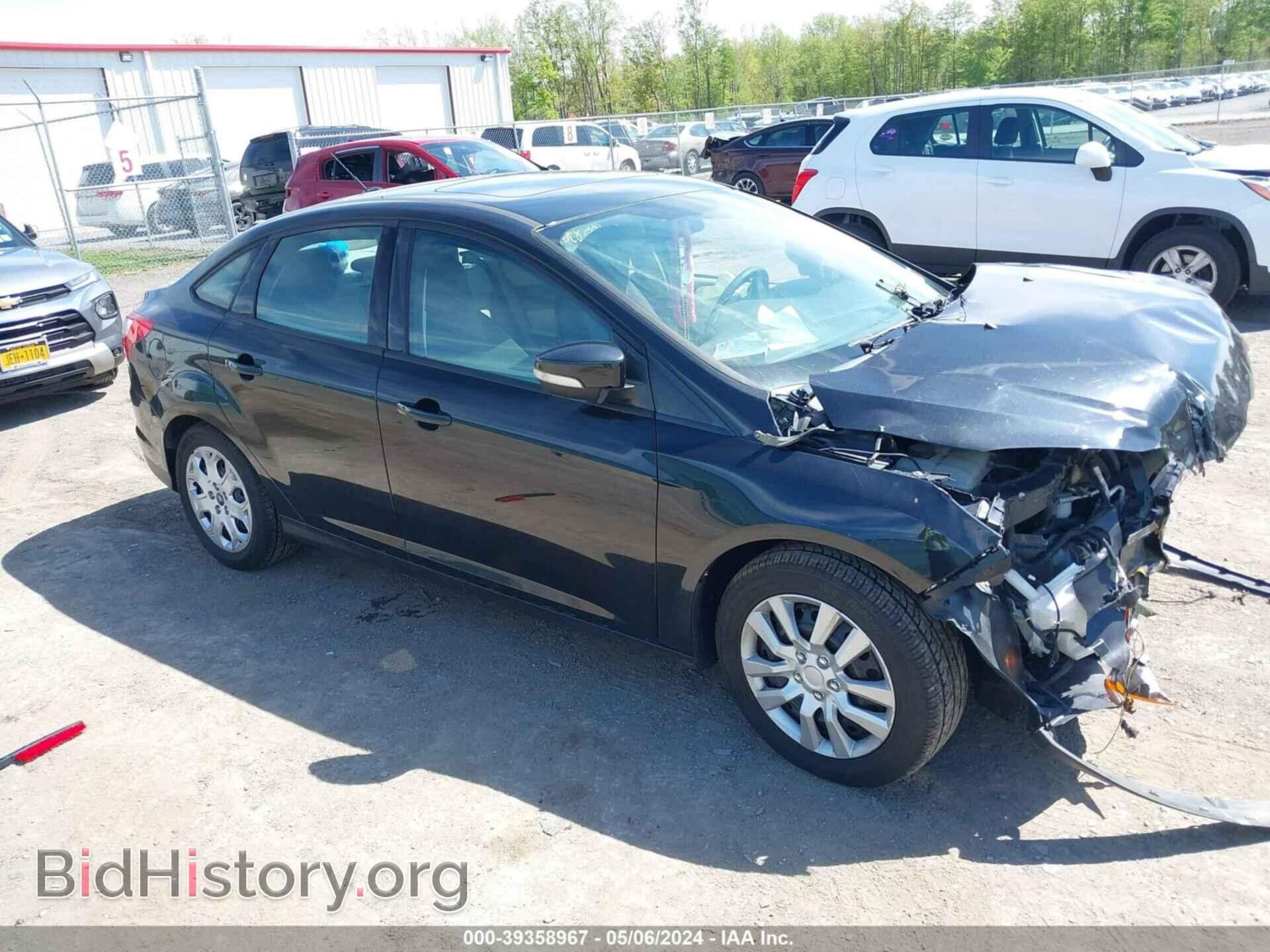Photo 1FAHP3F29CL463806 - FORD FOCUS 2012