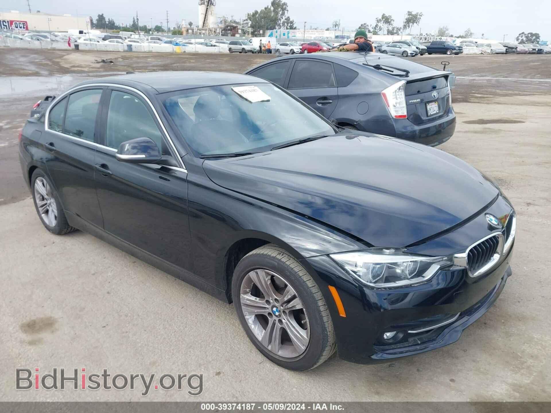 Фотография WBA8B9C59JEE82612 - BMW 330I 2018