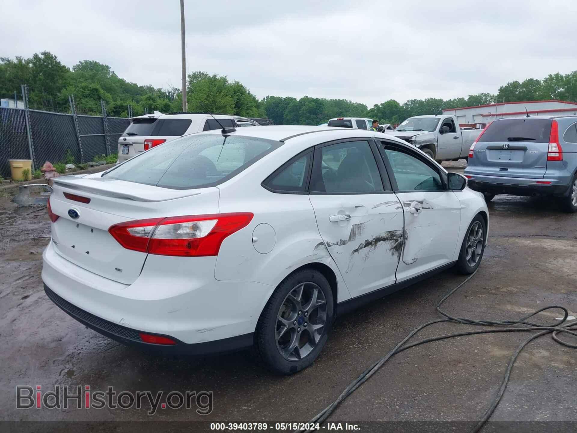 2014 FORD FOCUS - VIN: 1FADP3F25EL307120 - Photo 4