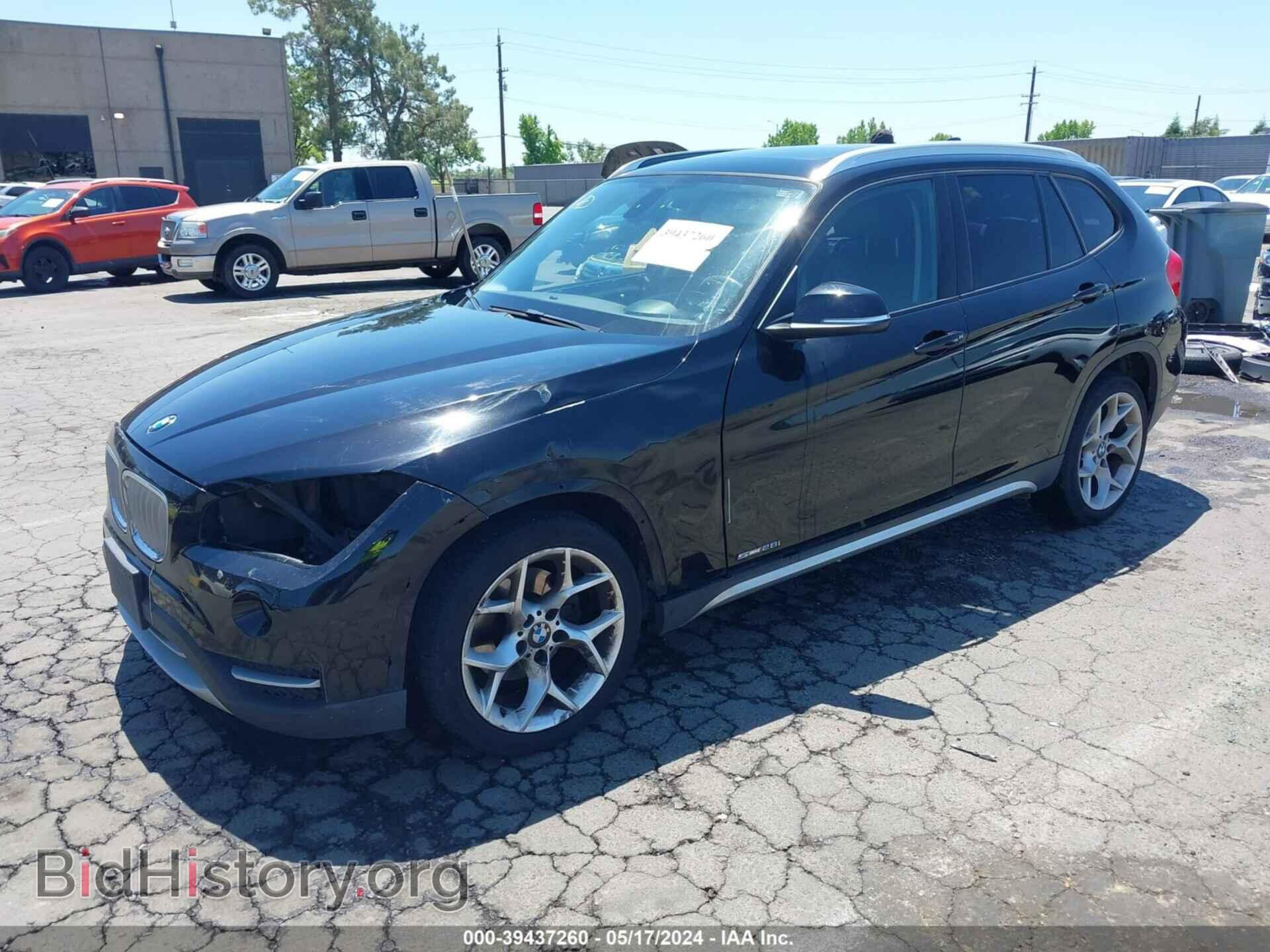 2014 BMW X1 - VIN: WBAVM1C55EVW48867 - Фото 2