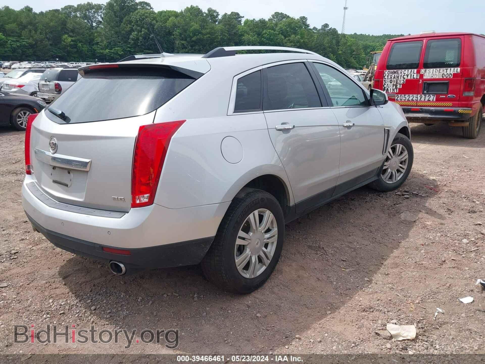 2014 CADILLAC SRX - VIN: 3GYFNBE32ES674820 - Фото 4