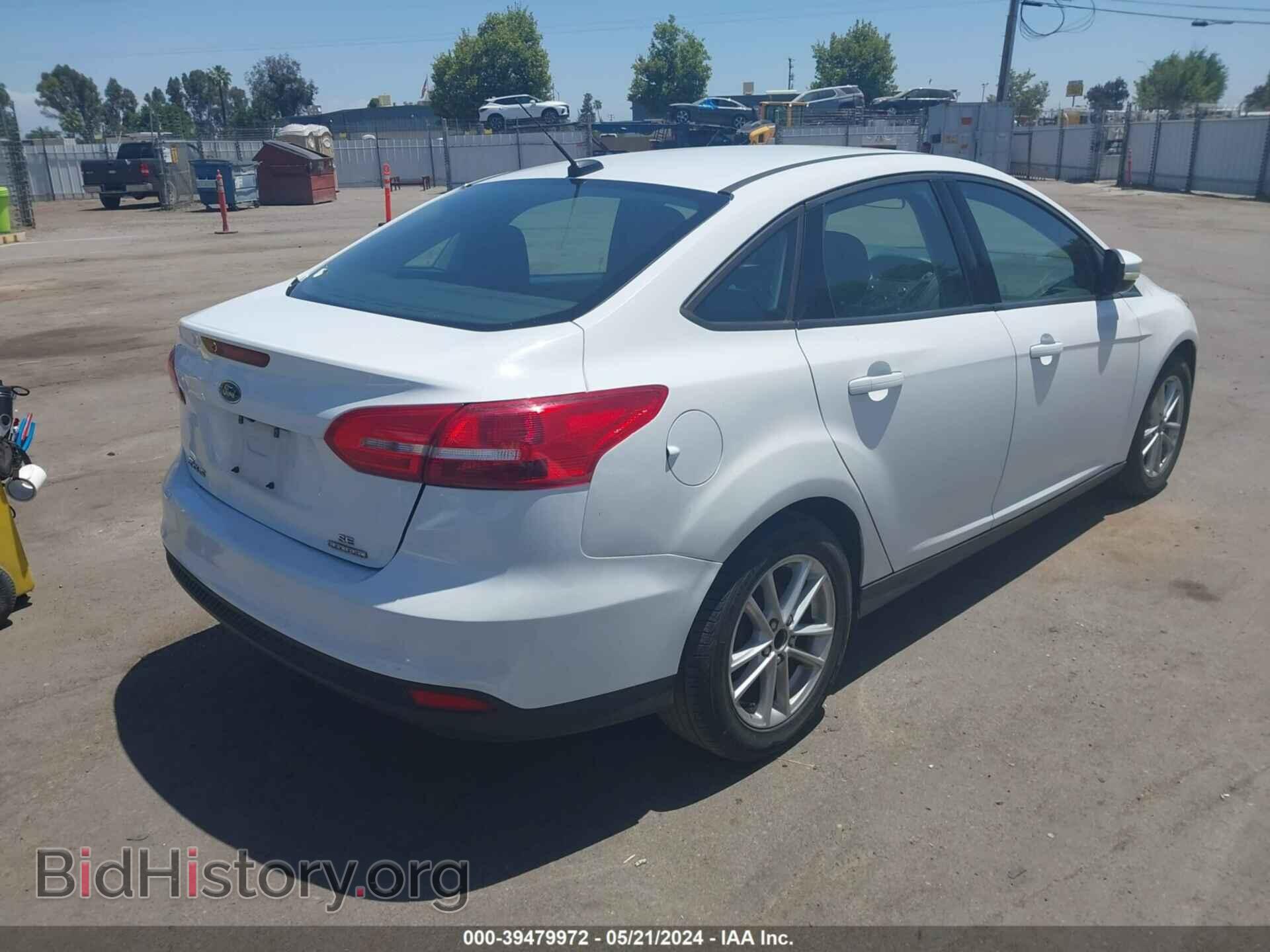 2016 FORD FOCUS - VIN: 1FADP3F25GL302048 - Photo 4