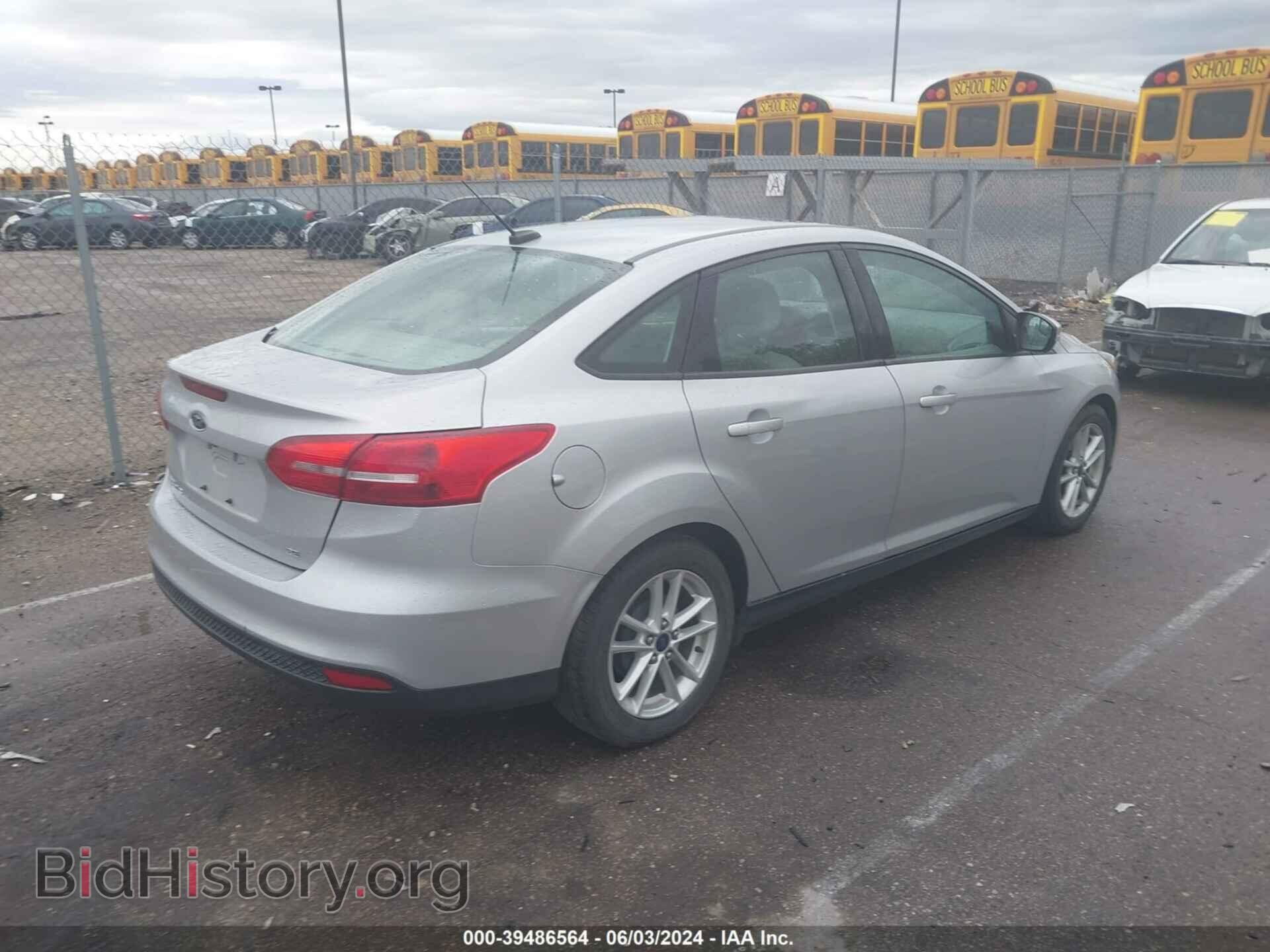 2015 FORD FOCUS - VIN: 1FADP3F21FL316950 - Photo 4