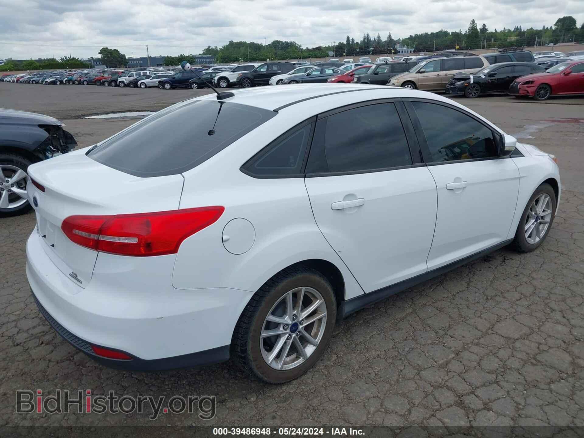 2016 FORD FOCUS - VIN: 1FADP3F2XGL271900 - Фото 4
