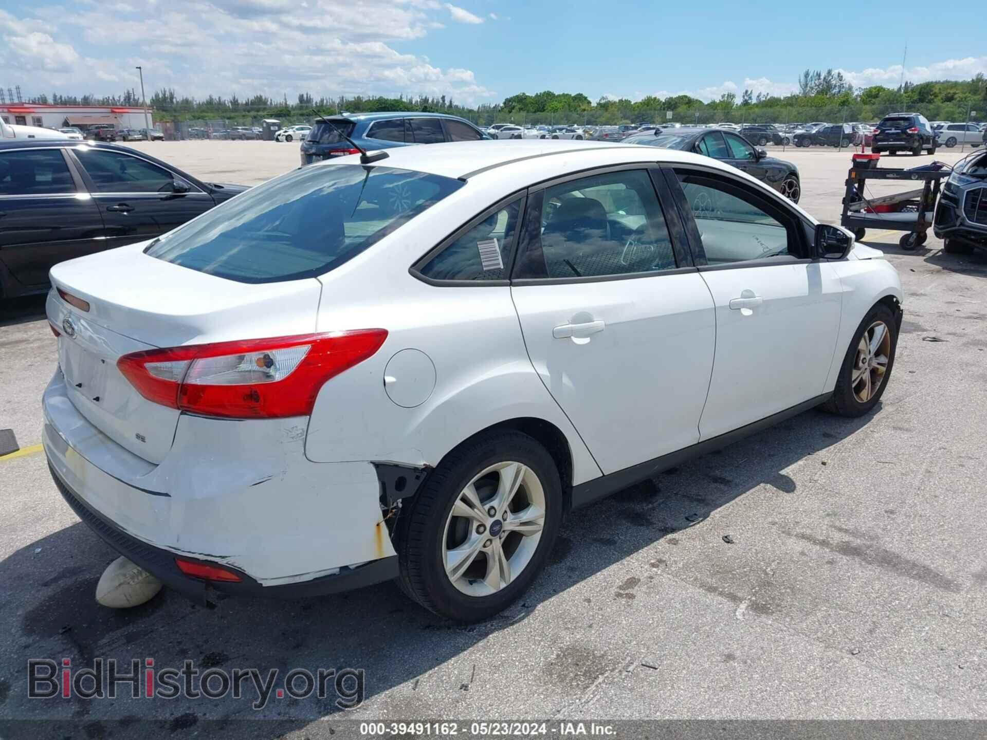 2013 FORD FOCUS - VIN: 1FADP3F21DL348620 - Photo 4