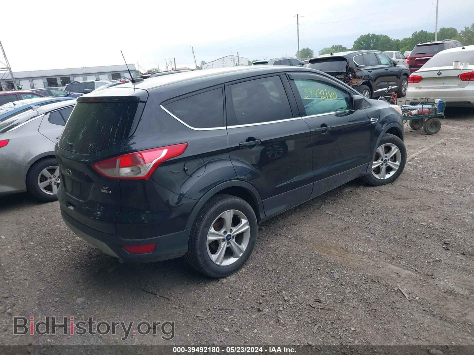 2014 FORD ESCAPE - VIN: 1FMCU9GX4EUC38552 - Photo 4