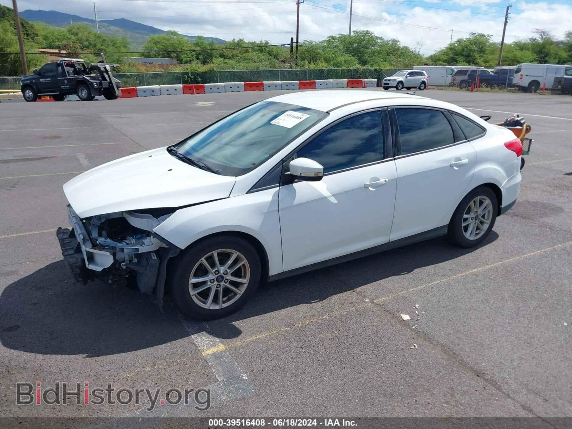 2016 FORD FOCUS - VIN: 1FADP3F29GL296688 - Фото 2