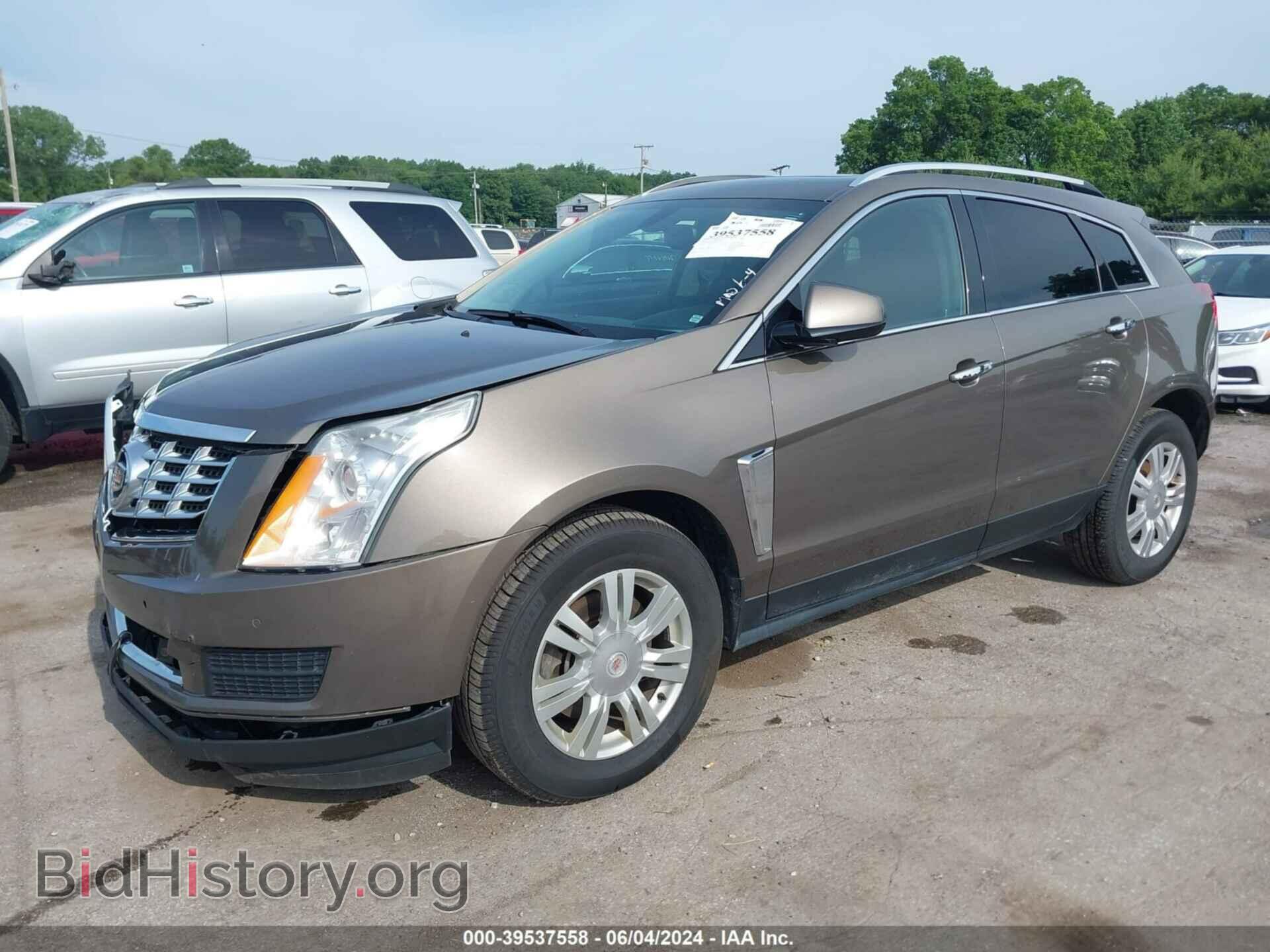 2014 CADILLAC SRX - VIN: 3GYFNBE33ES616246 - Фото 2