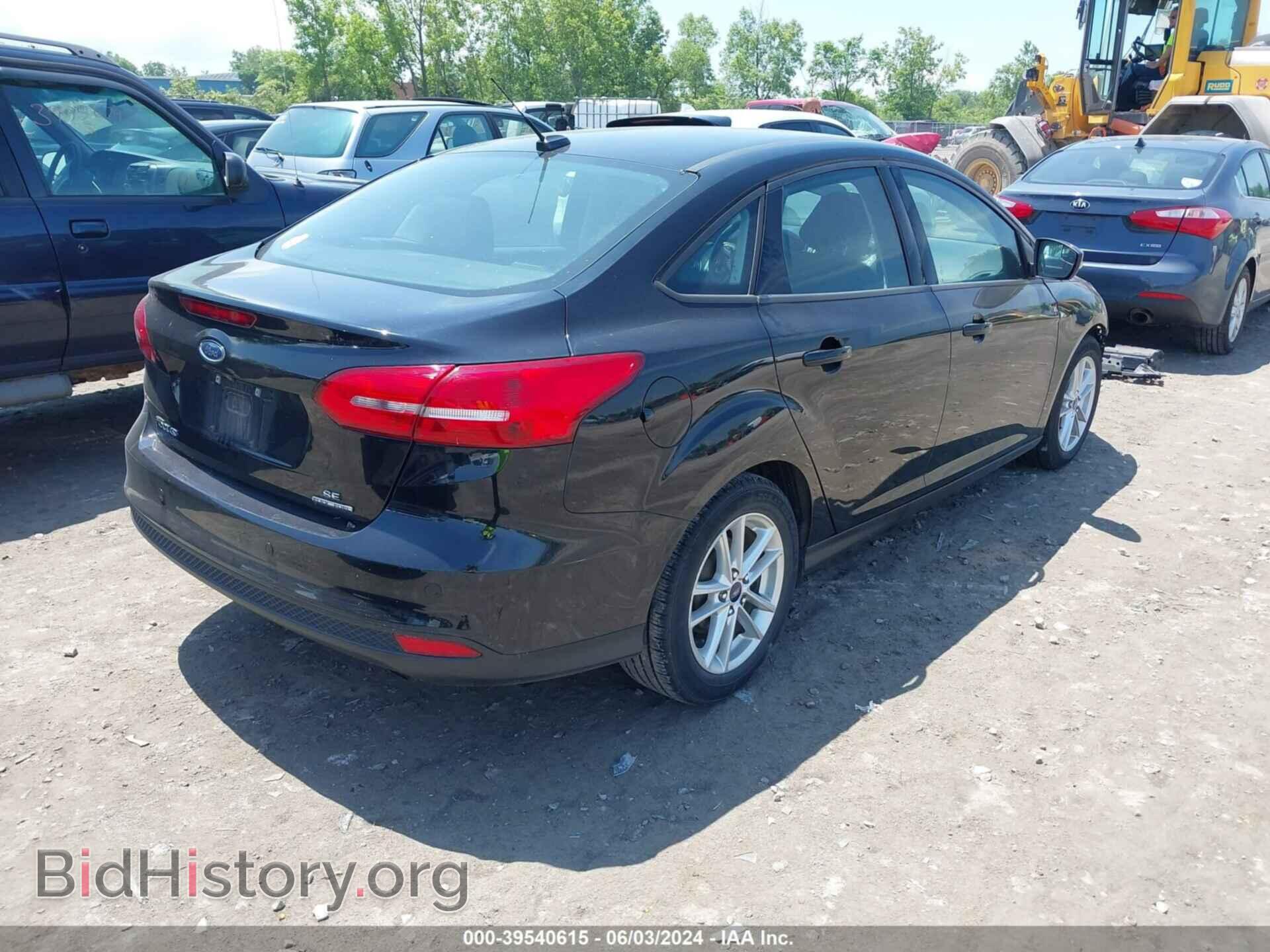 2016 FORD FOCUS - VIN: 1FADP3F2XGL324384 - Фото 4