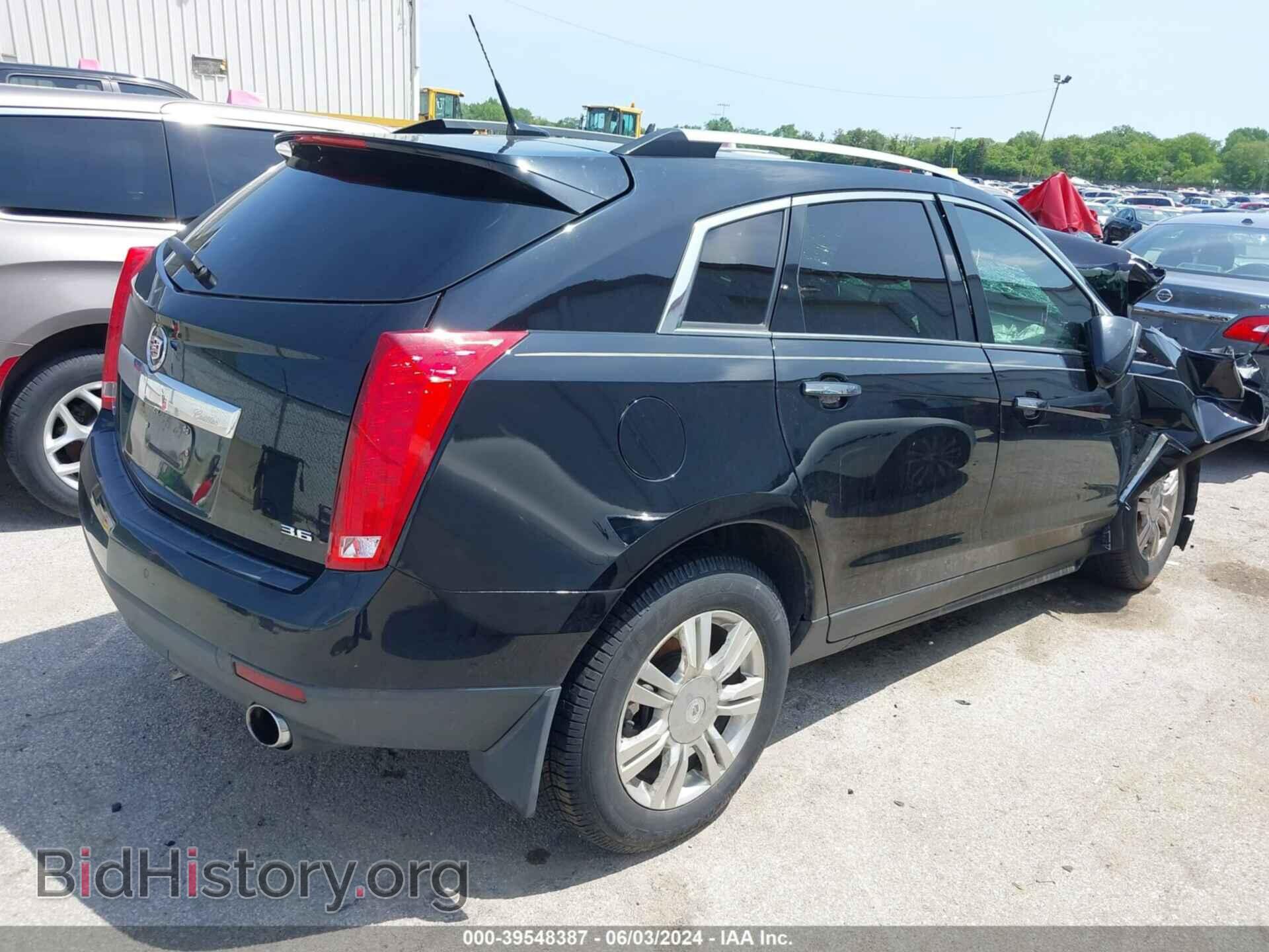 2014 CADILLAC SRX - VIN: 3GYFNBE37ES687532 - Фото 4