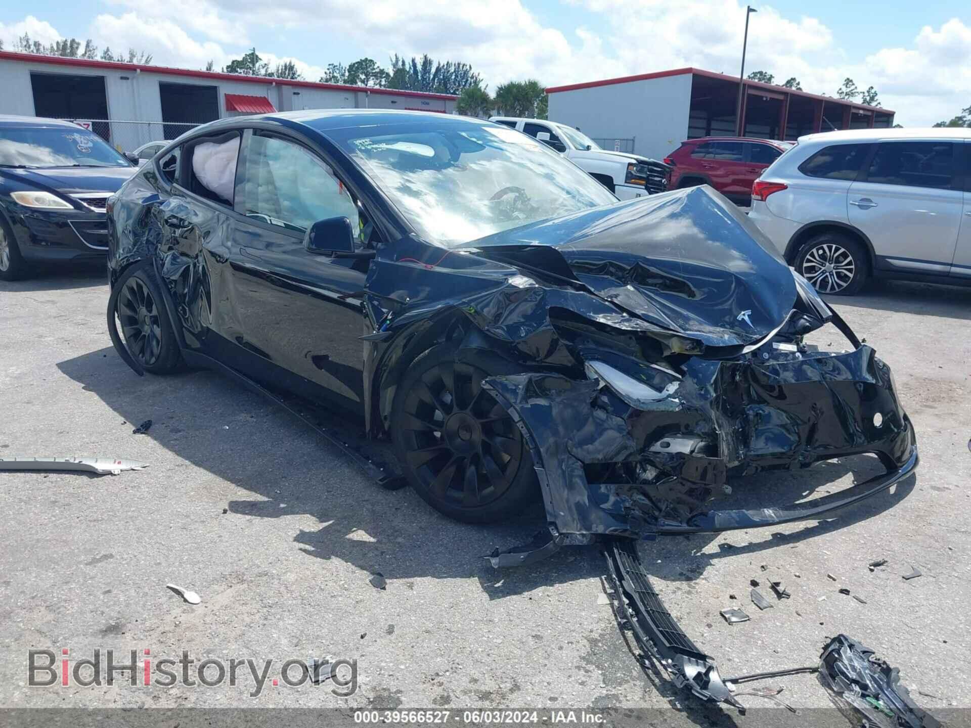 Фотография 7SAYGAEE3RF065743 - TESLA MODEL Y 2024