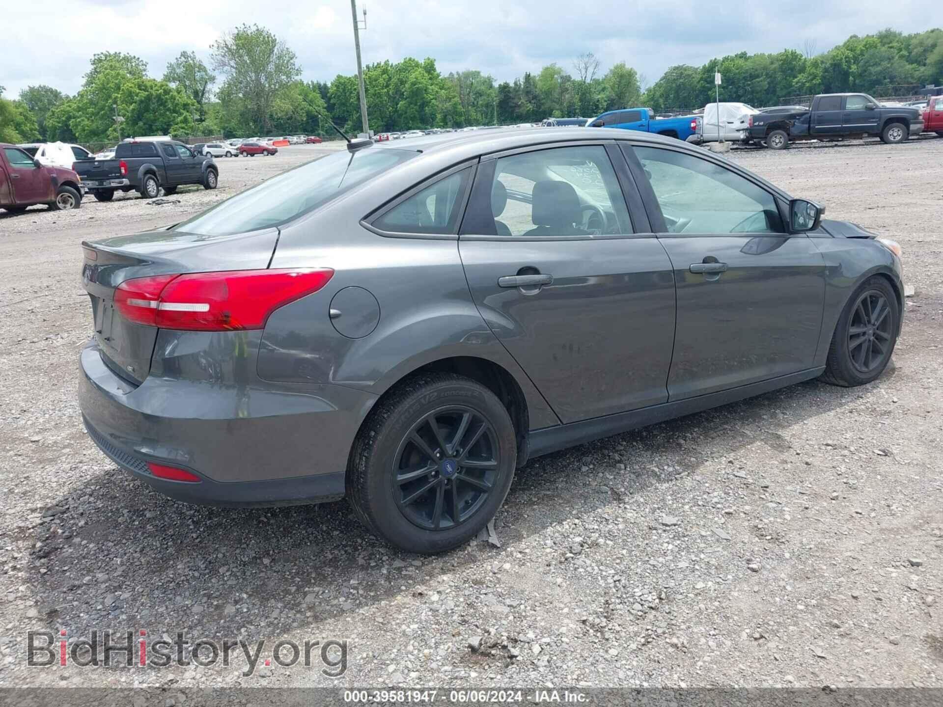 2017 FORD FOCUS - VIN: 1FADP3F25HL228860 - Photo 4