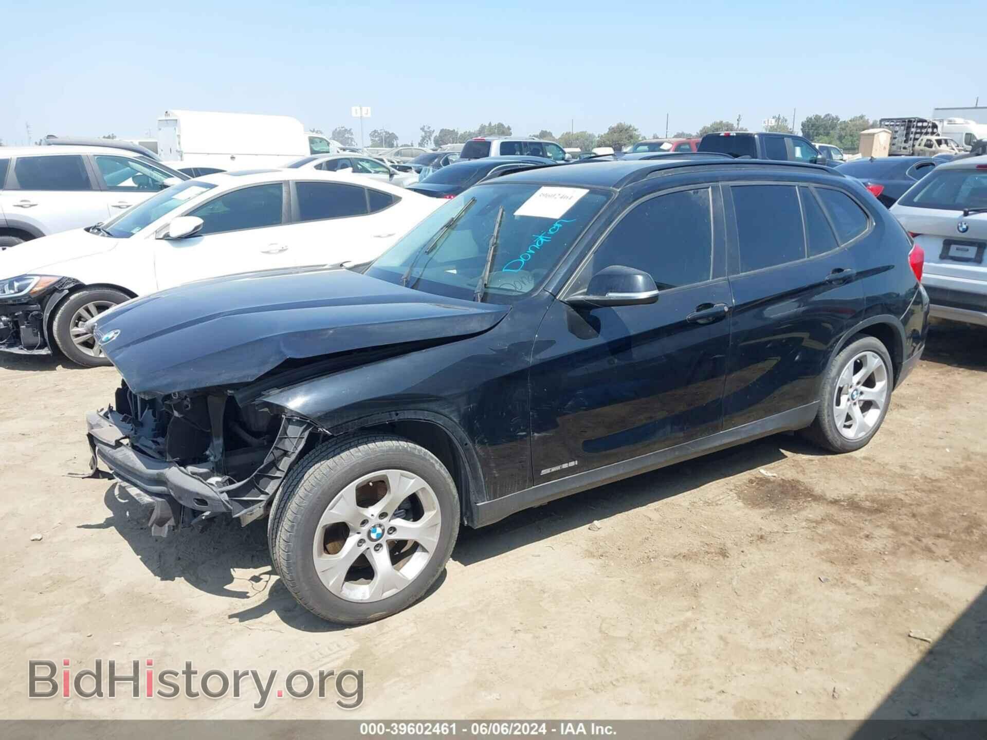 2014 BMW X1 - VIN: WBAVM1C50EVW54821 - Фото 2