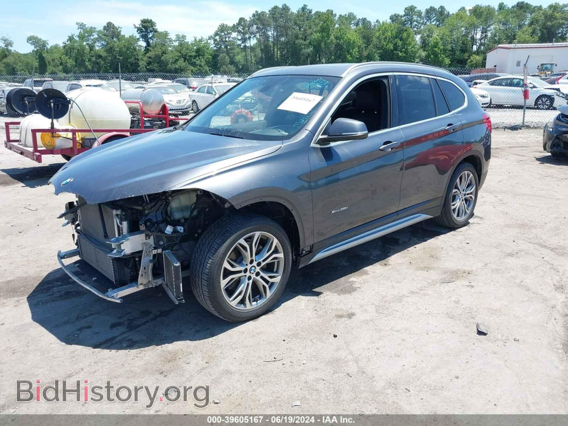 2017 BMW X1 - VIN: WBXHT3Z34H4A57336 - Фото 2
