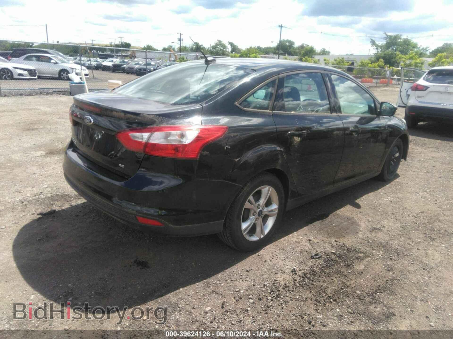 2014 FORD FOCUS - VIN: 1FADP3F24EL295381 - Photo 4