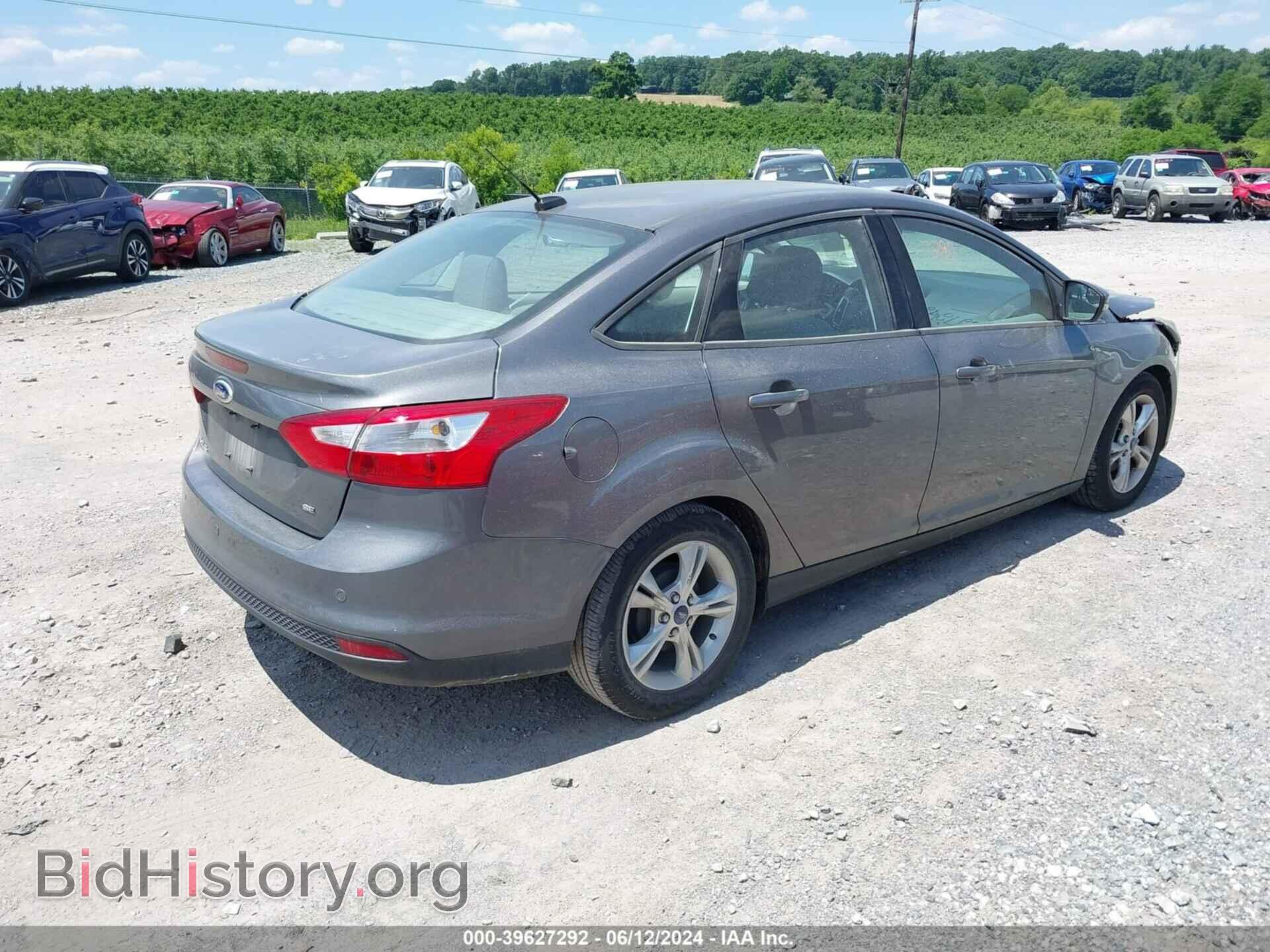 2014 FORD FOCUS - VIN: 1FADP3F20EL164965 - Photo 4