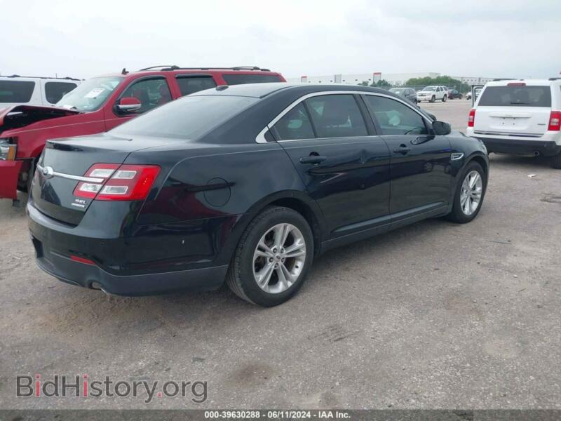 2014 Ford TAURUS (VIN 1FAHP2E84EG147936) — фото 4 из 13