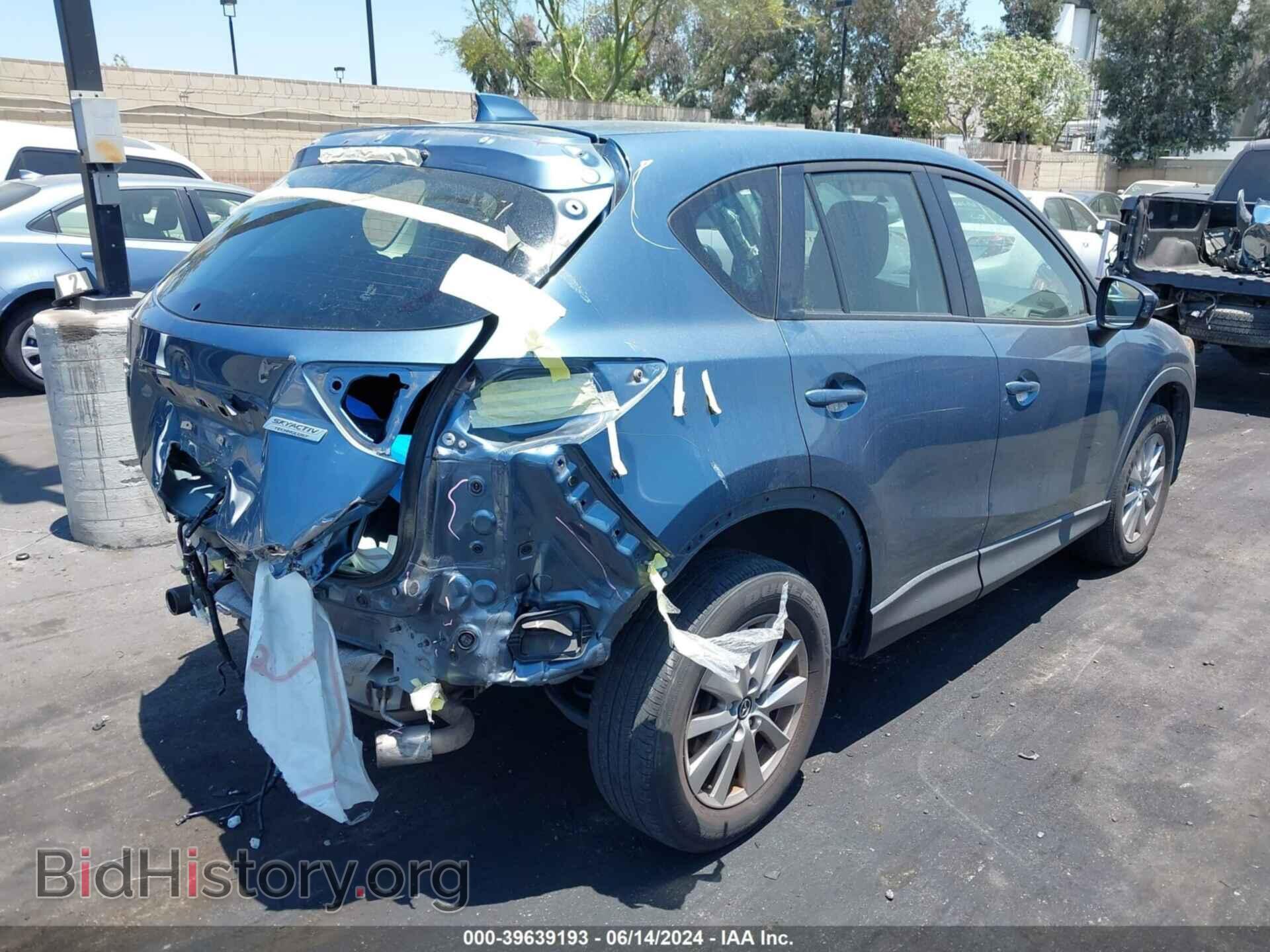 2014 MAZDA CX-5 - VIN: JM3KE2BE4E0404285 - Фото 4