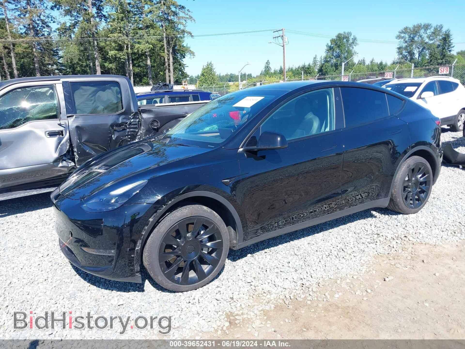 2023 TESLA MODEL Y - VIN: 7SAYGAEEXPF799616 - Фото 2