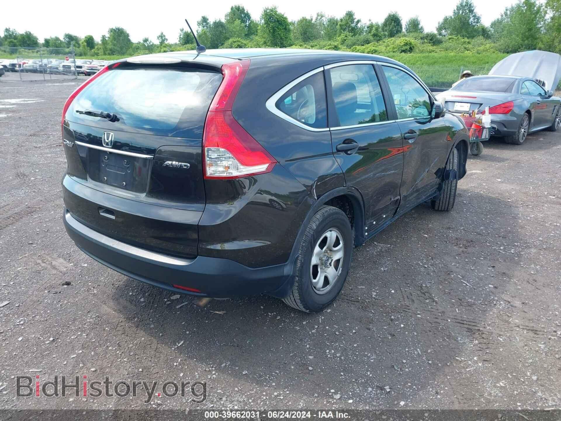 2014 HONDA CR-V - VIN: 2HKRM4H31EH693107 - Фото 4