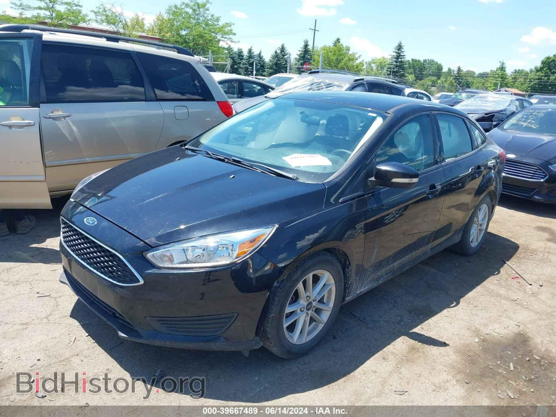 2016 FORD FOCUS - VIN: 1FADP3F23GL394714 - Фото 2