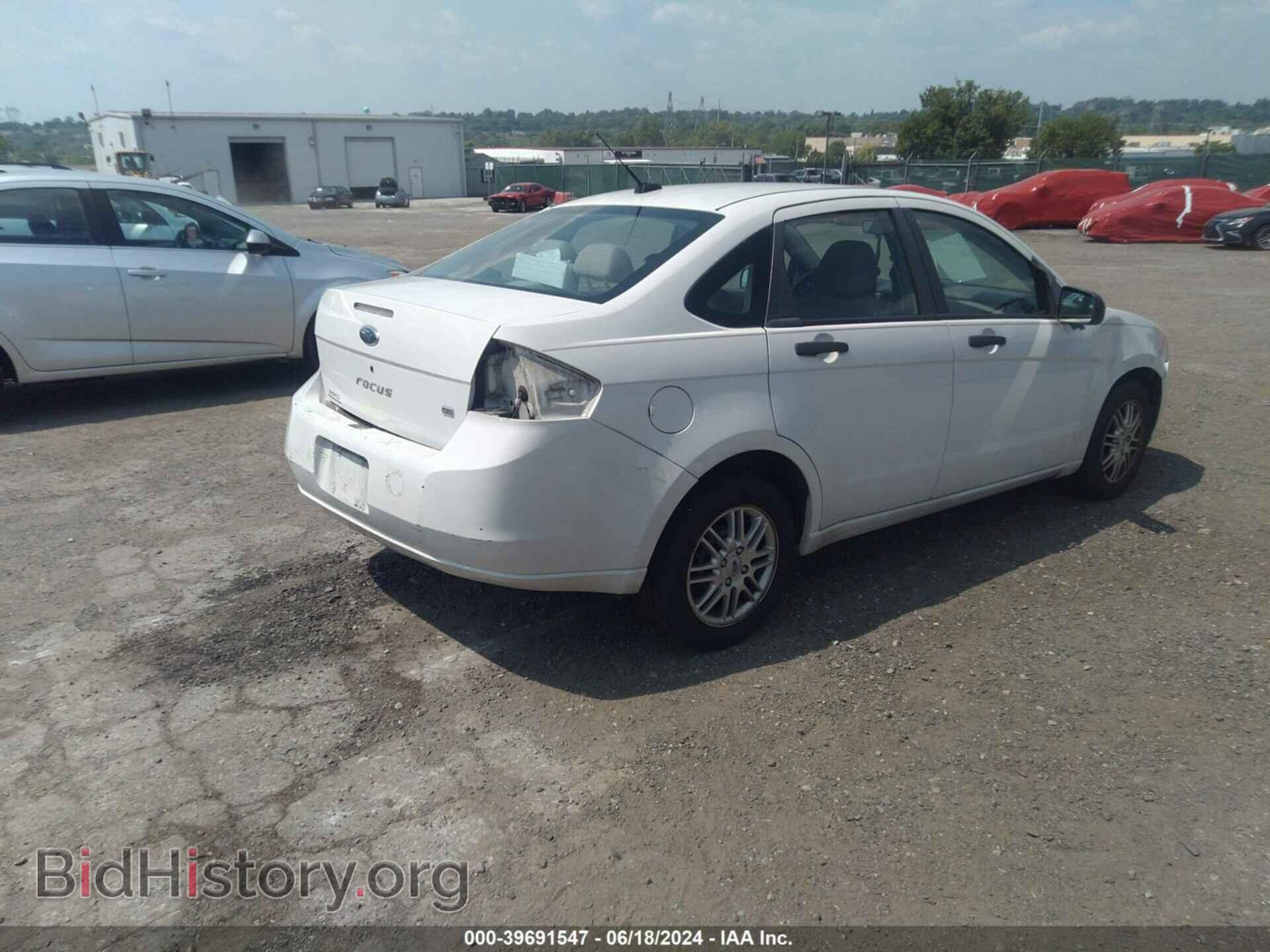 2009 FORD FOCUS - VIN: 1FAHP35N79W148702 - Фото 4