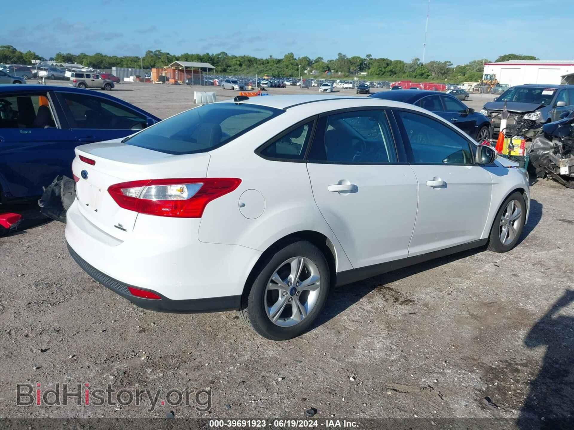 2014 FORD FOCUS - VIN: 1FADP3F21EL312833 - Photo 4