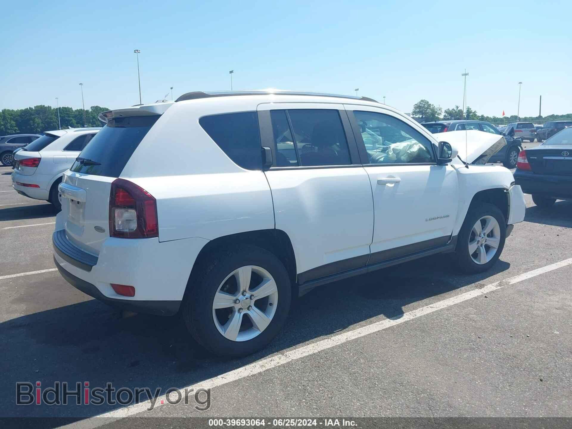 2014 JEEP COMPASS - VIN: 1C4NJDEB7ED670908 - Photo 4