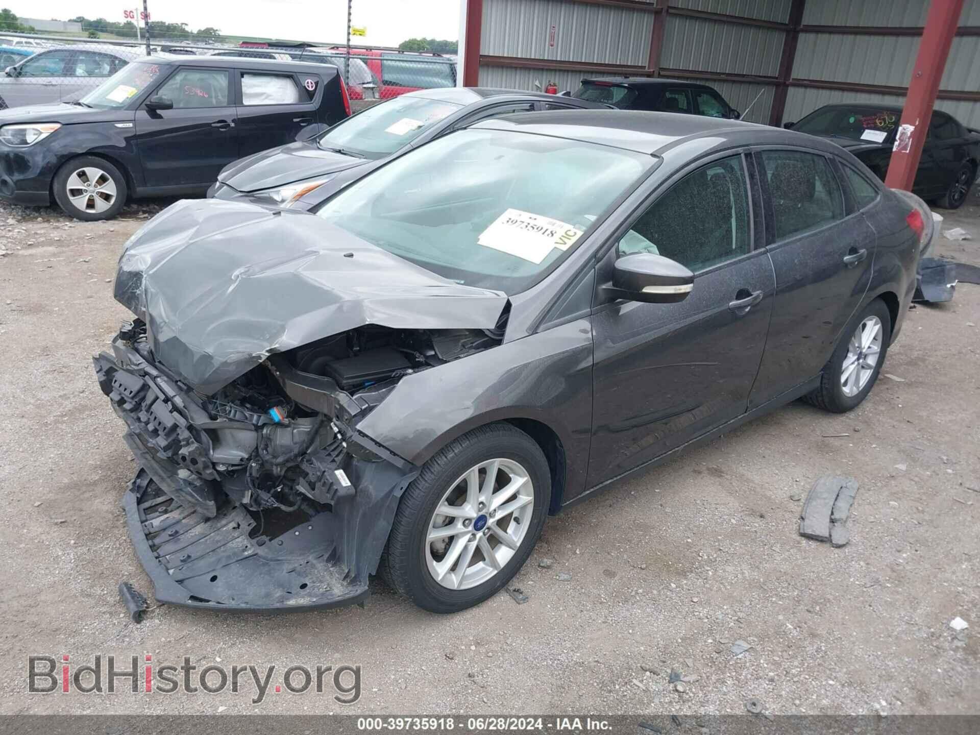 2016 FORD FOCUS - VIN: 1FADP3F25GL373816 - Фото 2