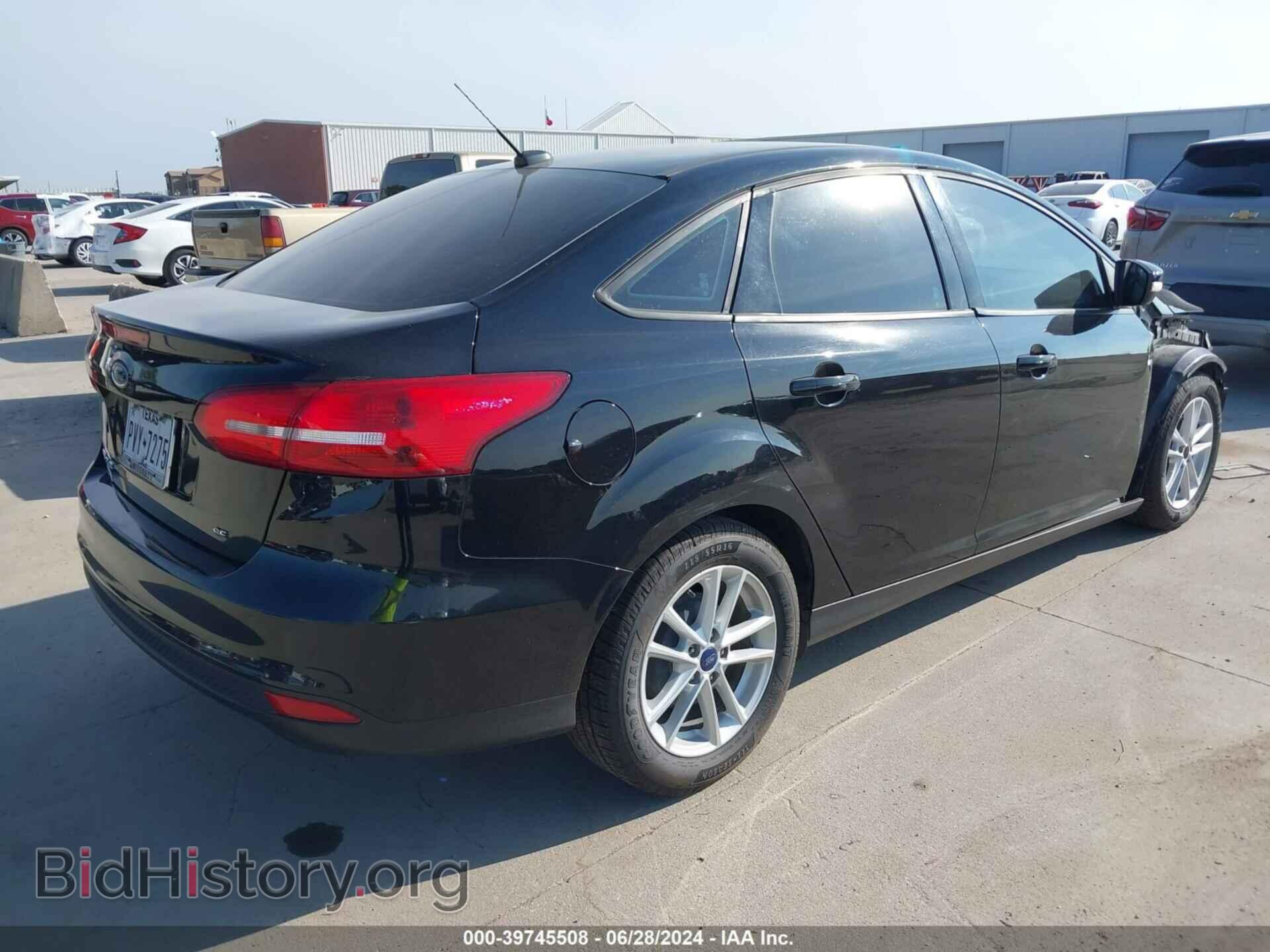 2017 FORD FOCUS - VIN: 1FADP3F20HL303710 - Photo 4