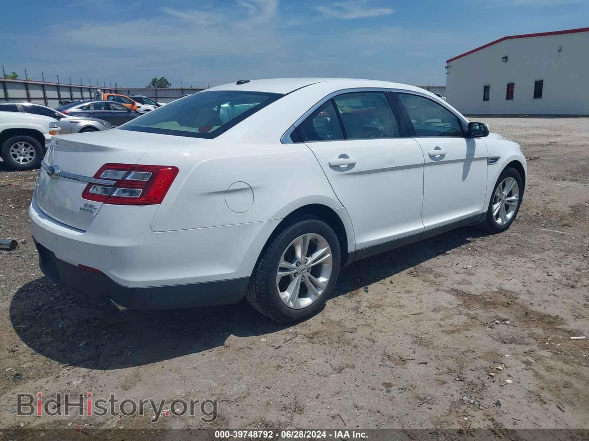 2014 FORD TAURUS - VIN: 1FAHP2E81EG100203 - Photo 4