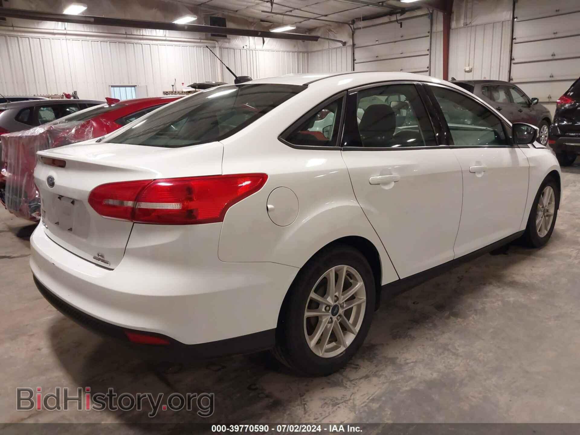 2016 FORD FOCUS - VIN: 1FADP3F29GL297128 - Photo 4
