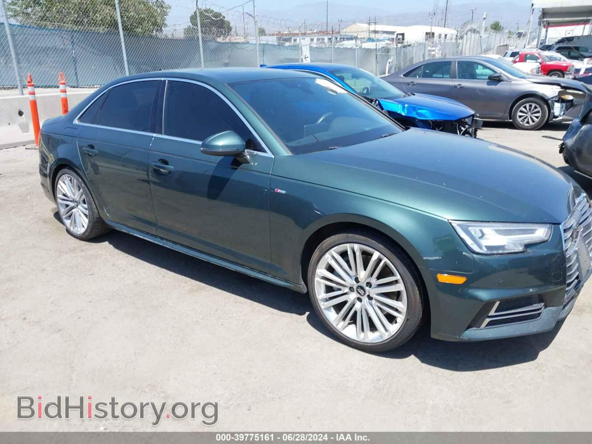 Фотография WAUENAF44HN014602 - AUDI A4 2017