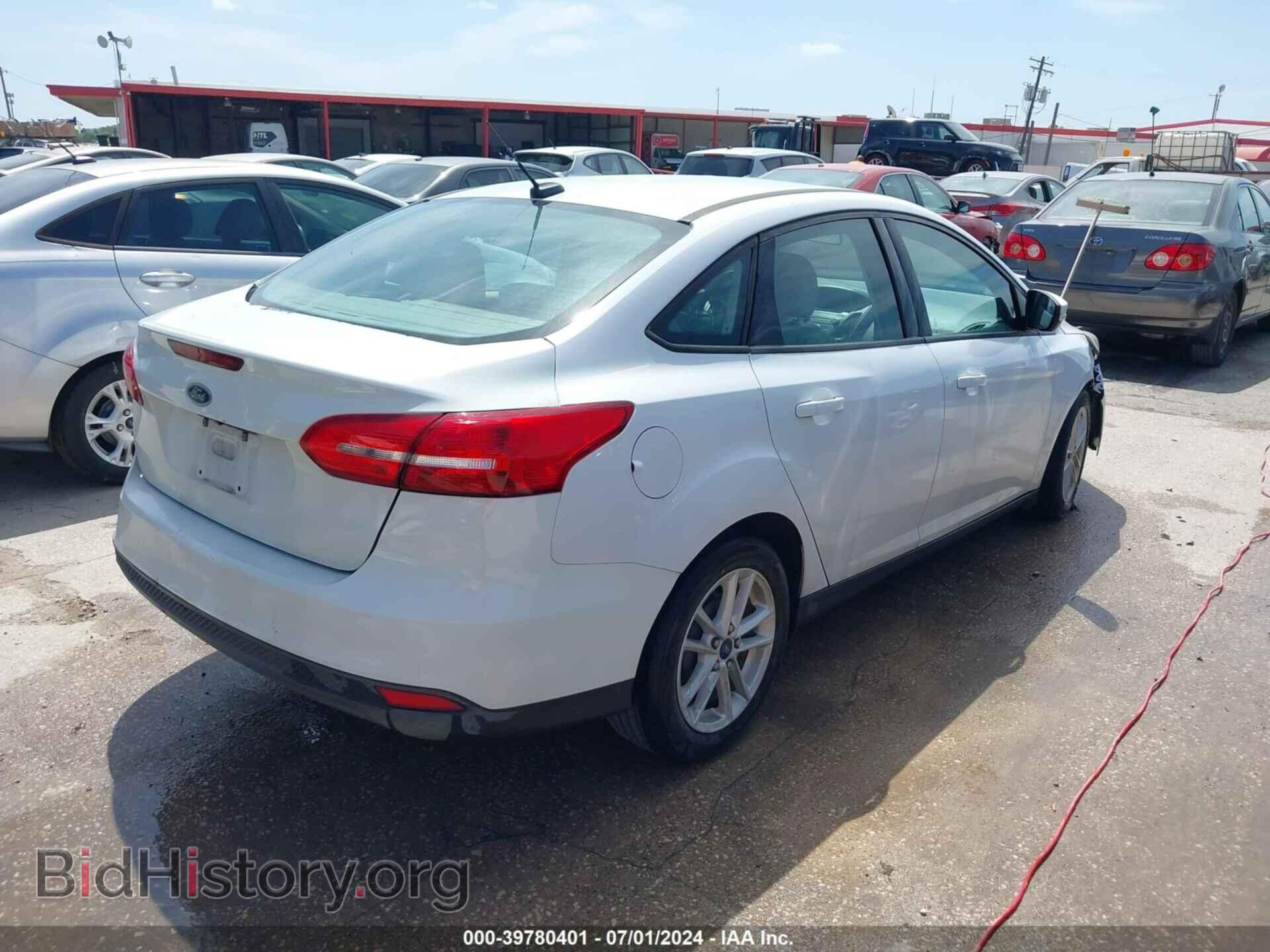 2015 FORD FOCUS - VIN: 1FADP3F24FL327473 - Фото 4