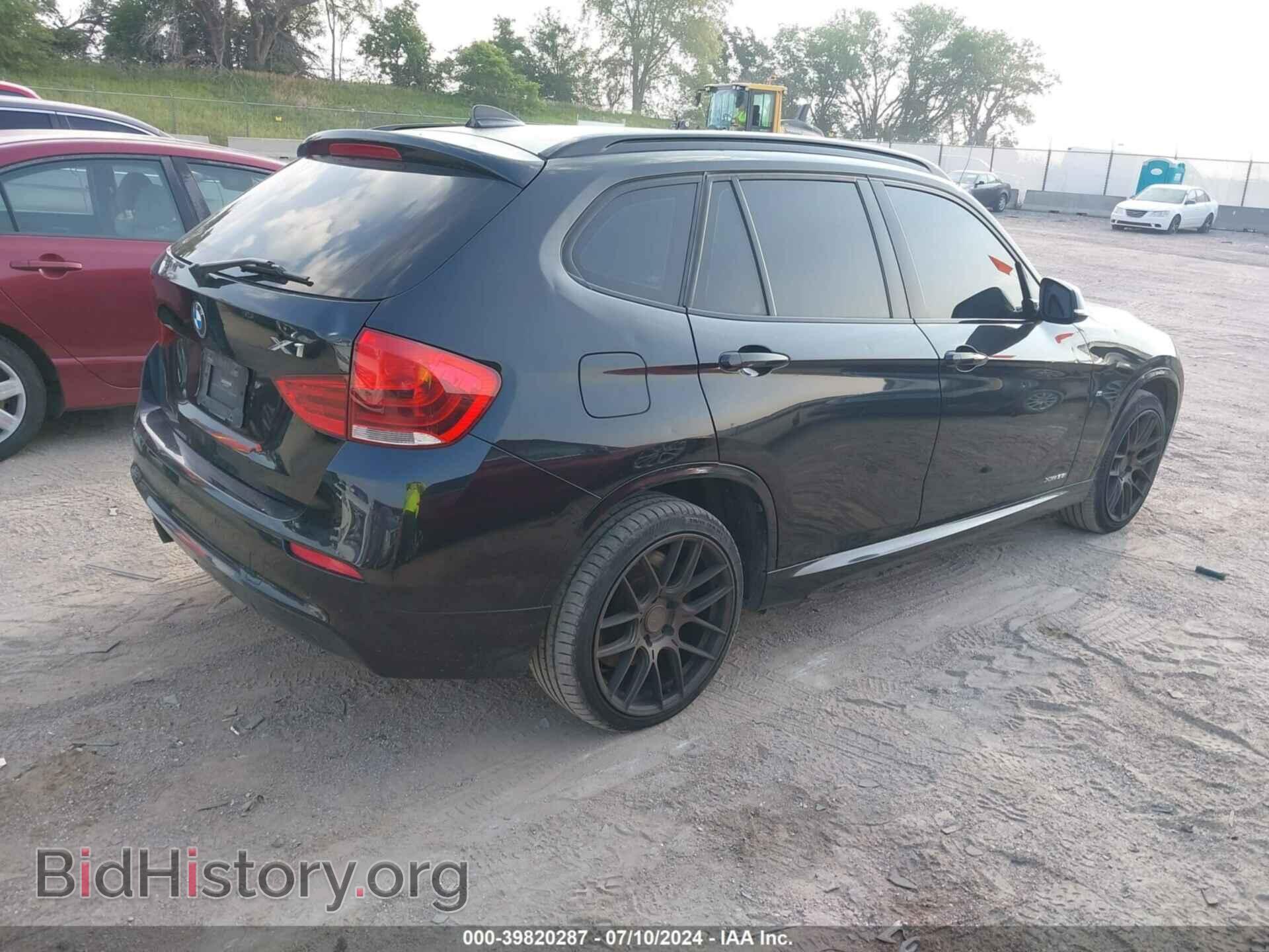 2014 BMW X1 - VIN: WBAVM5C56EVV92784 - Фото 4