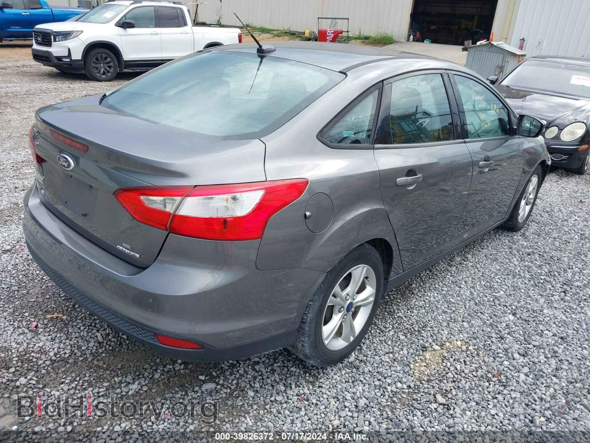 2014 FORD FOCUS - VIN: 1FADP3F25EL318652 - Photo 4