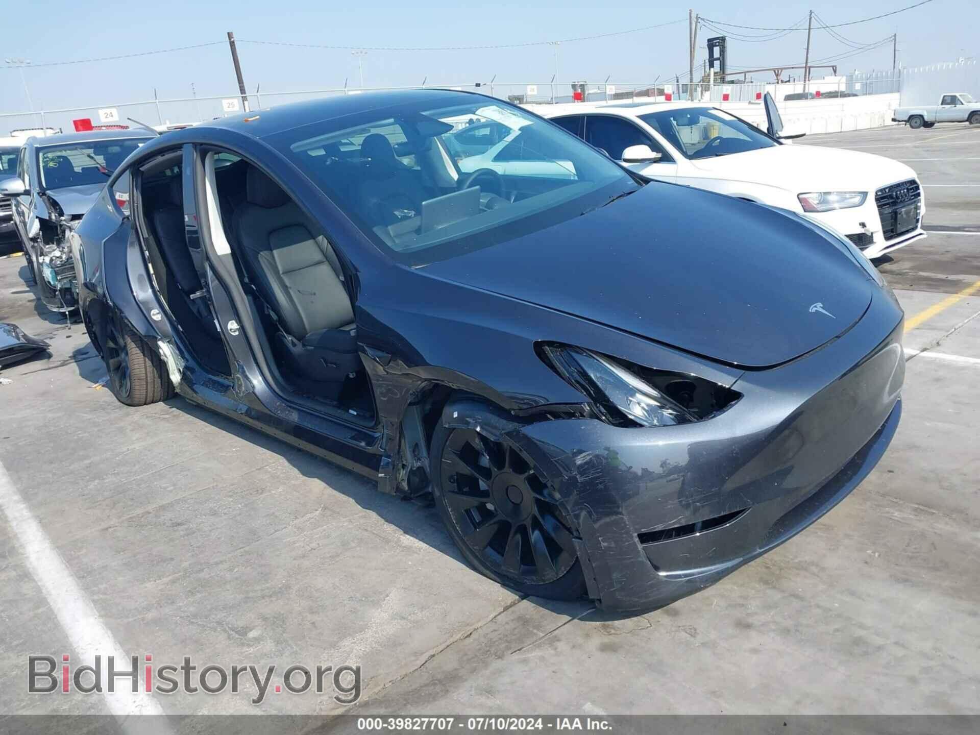 Фотография 7SAYGDED6RF051635 - TESLA MODEL Y 2024