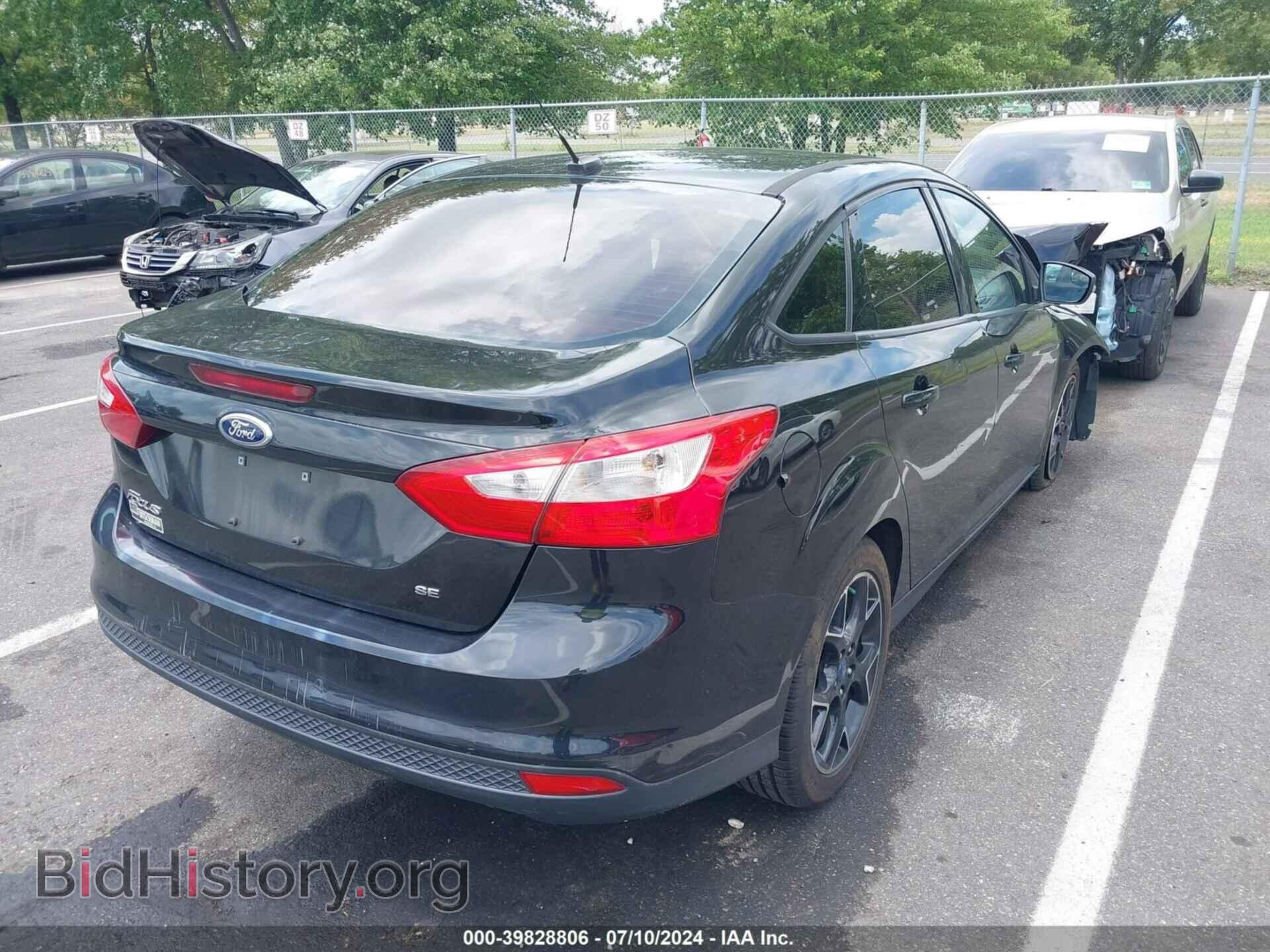 2013 FORD FOCUS - VIN: 1FADP3F22DL103647 - Photo 4