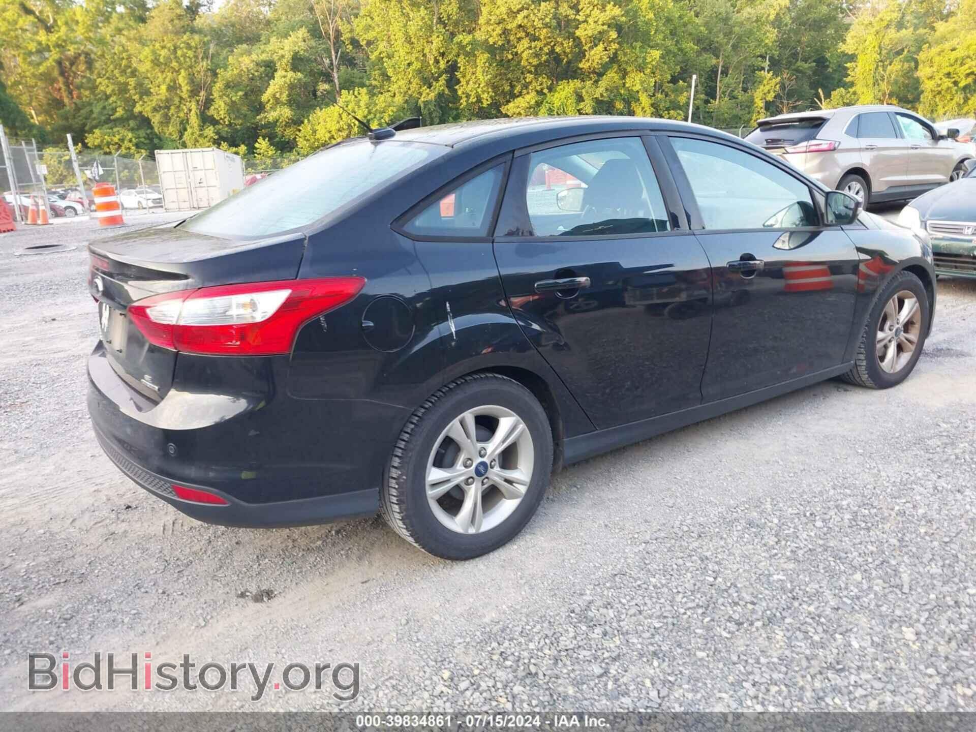 2014 FORD FOCUS - VIN: 1FADP3F21EL172802 - Photo 4